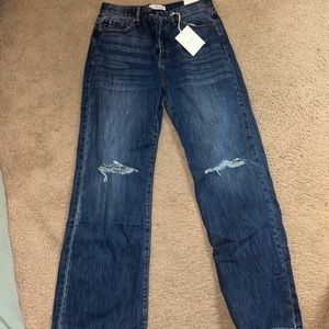 Dark wash hi rise blue jeans, small bootcut